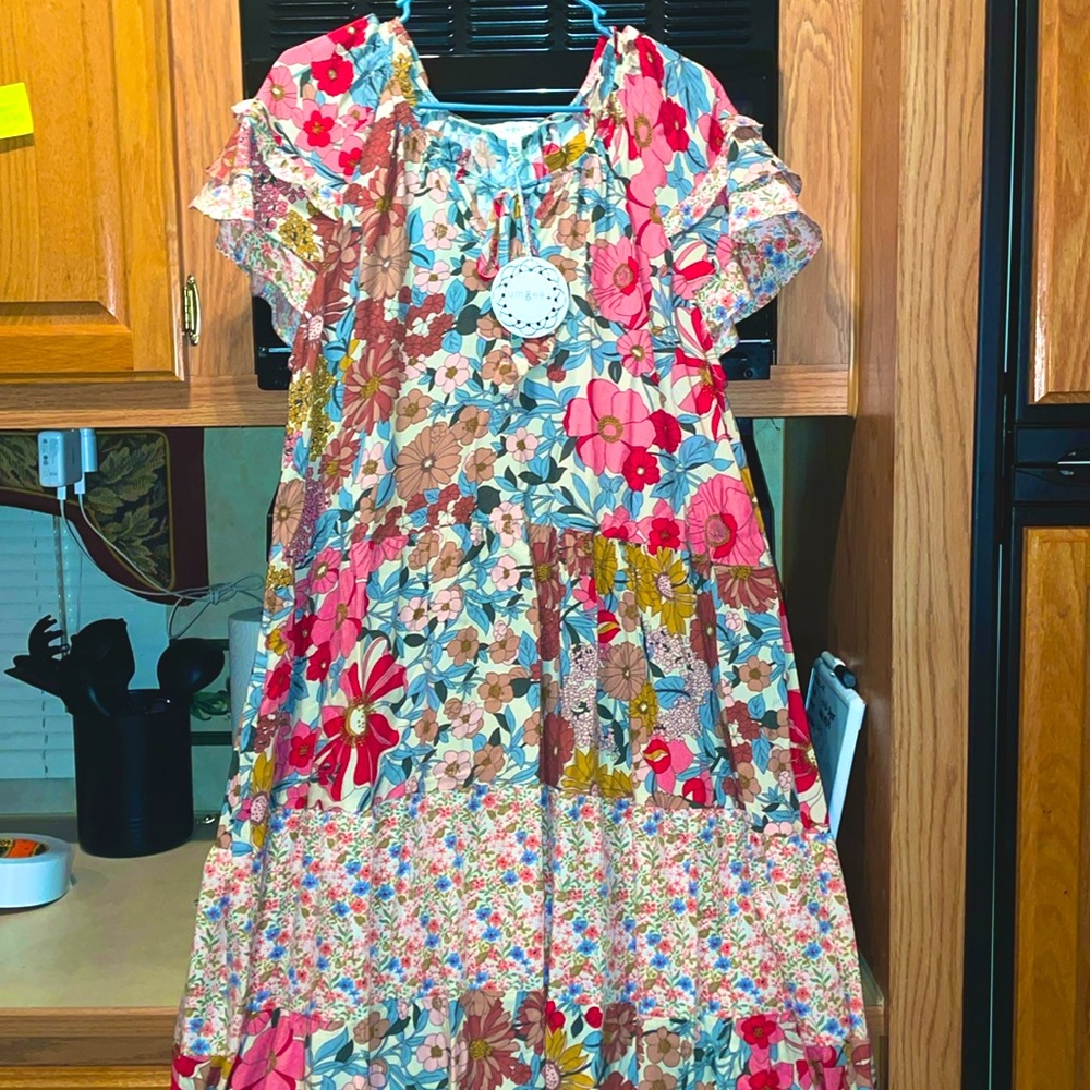 Umgee Brand. I bought from Hamricks, but too big for me. Size XL. Never worn.